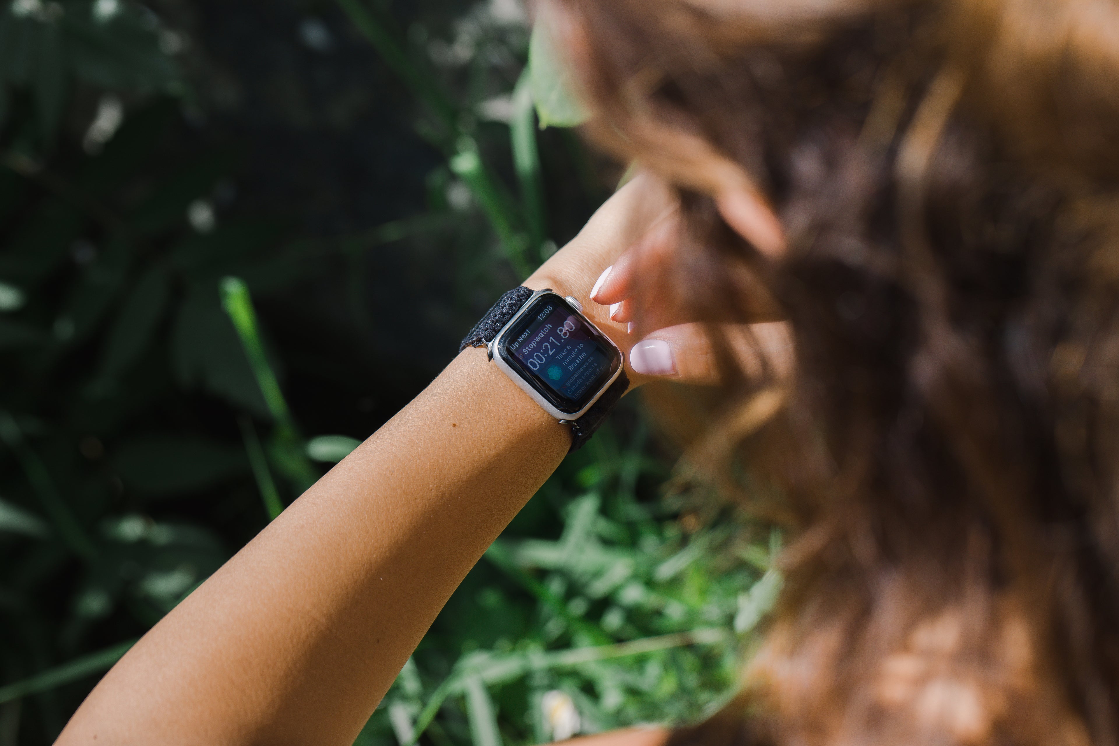 files/person-checks-their-smartwatch-outdoors.jpg